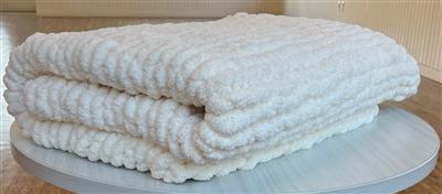 Cream blanket from side